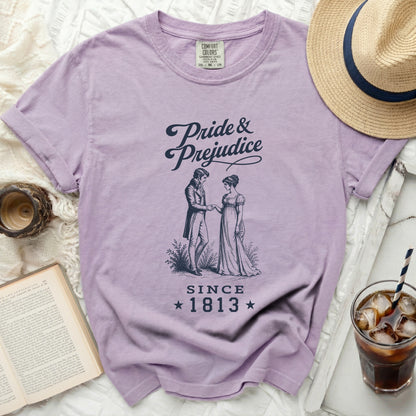Purple t-shirt with Pride and Prejudice graphic and "Since 1813".