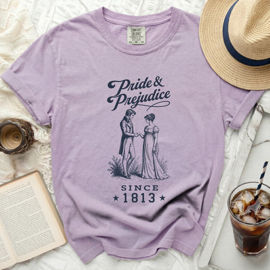 Purple t-shirt with Pride and Prejudice graphic and "Since 1813".