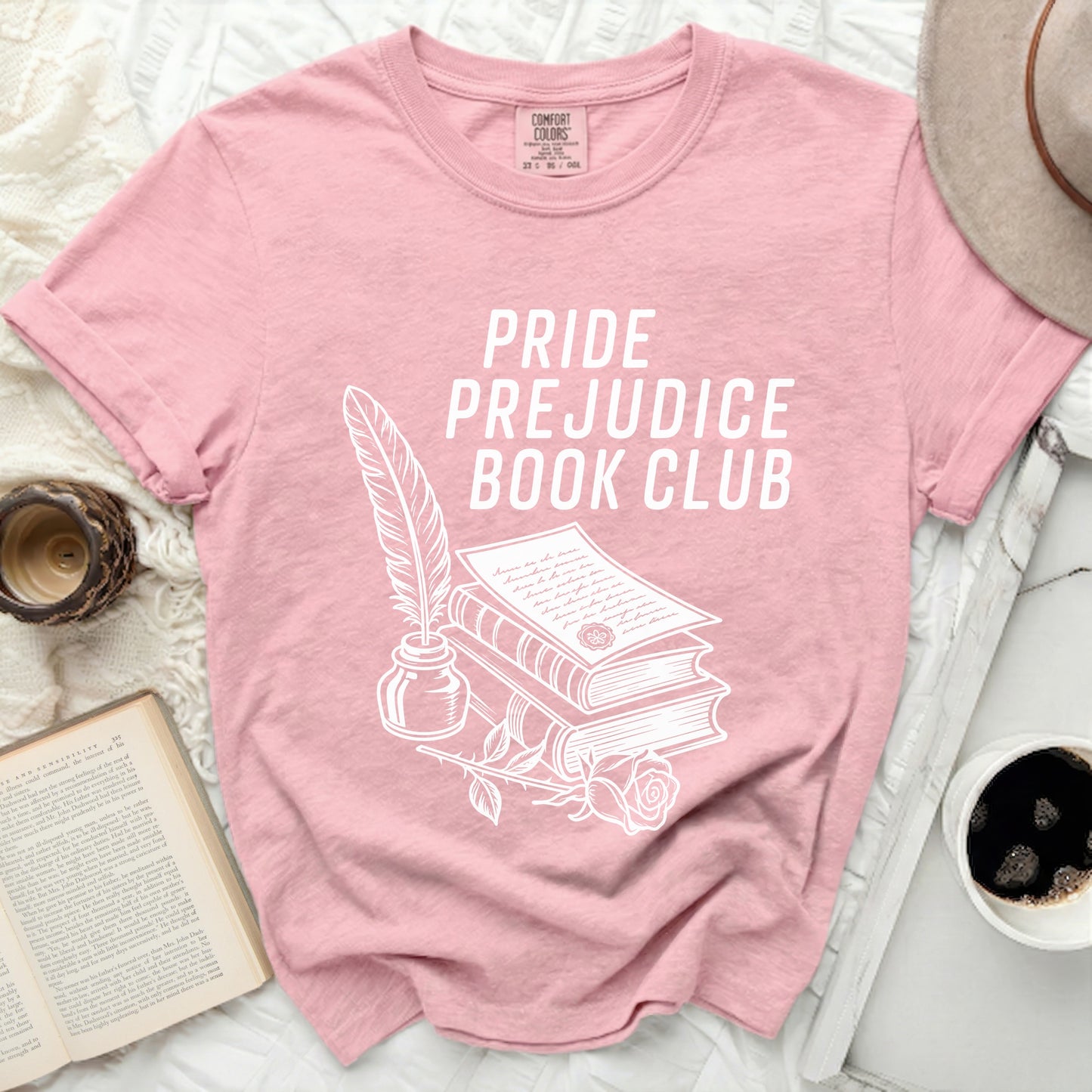 Pink t-shirt with "Pride Prejudice Book Club" and book illustration.