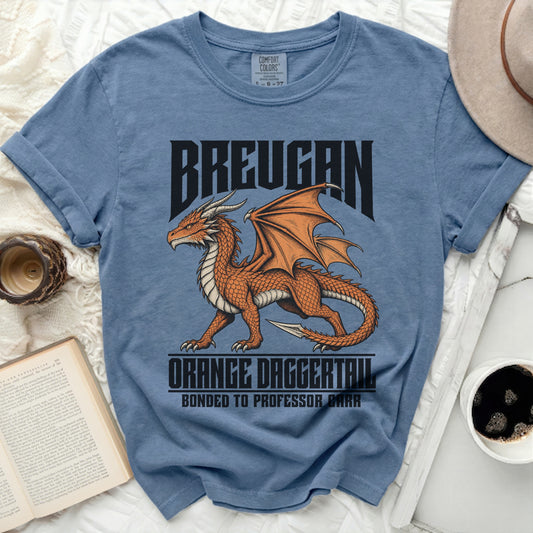 Blue t-shirt with "Breugan Orange Daggertail Bonded to Professor Barr" text and orange dragon graphic.