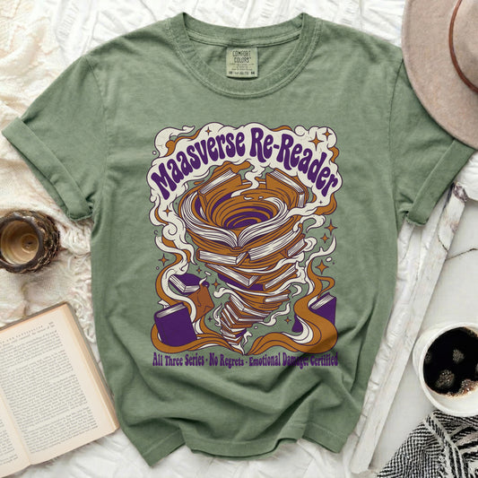 Green t-shirt with "Maasverse Re-Reader" and book tornado graphic.