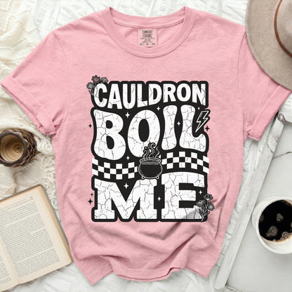 Pink t-shirt with "Cauldron Boil Me" graphic and cauldron illustration.