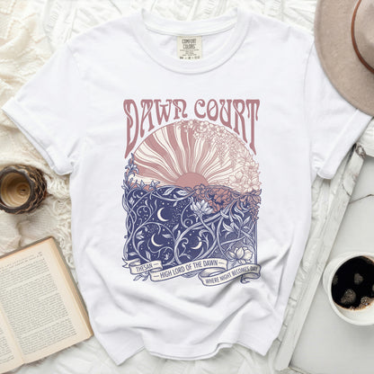 White t-shirt with "Dawn Court" and sun/night floral design.
