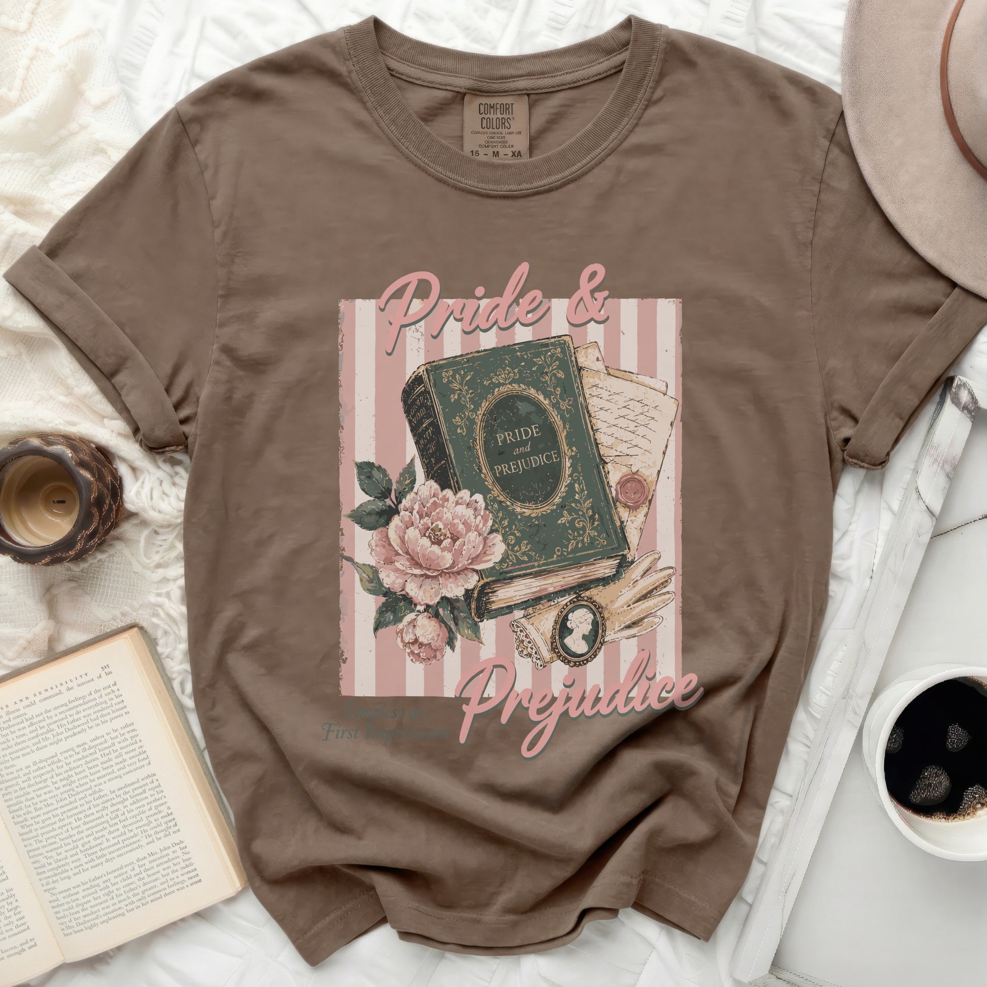 Brown t-shirt with "Pride & Prejudice" graphic and vintage book design.