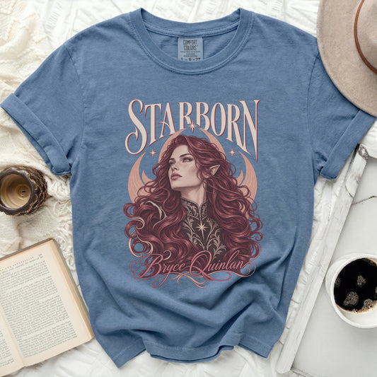 Blue t-shirt with "STARBORN" and "Bryce Quinlan" text and illustration.