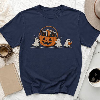 Navy t-shirt with graphic of ghosts carrying a pumpkin basket of books.
