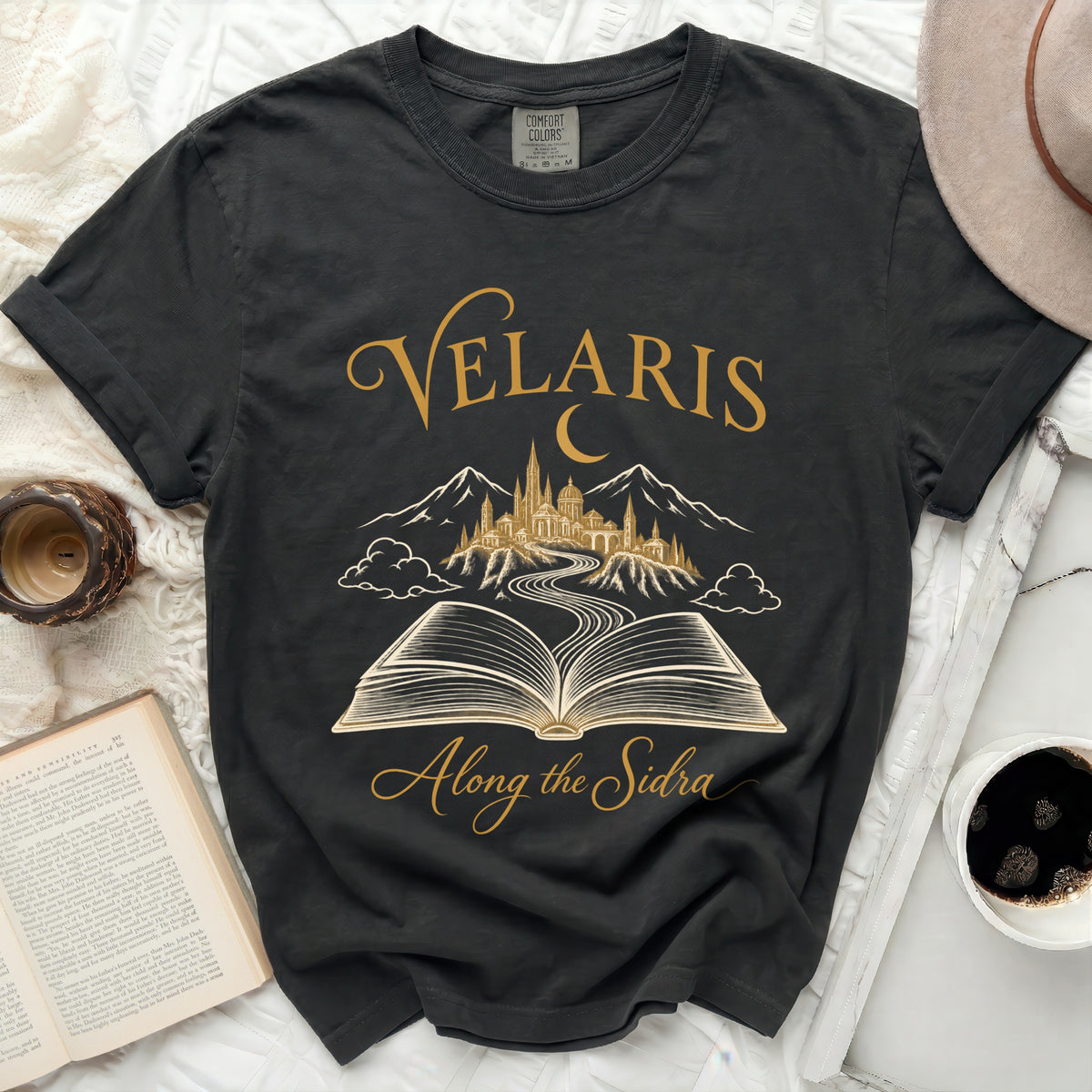 Black t-shirt with "Velaris Along the Sidra" text and fantasy art.