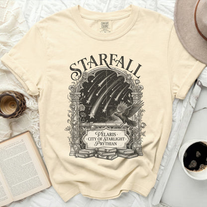 T-shirt with "STARFALL VELARIS CITY OF STARLIGHT PRYTHIAN" graphic and a raven.