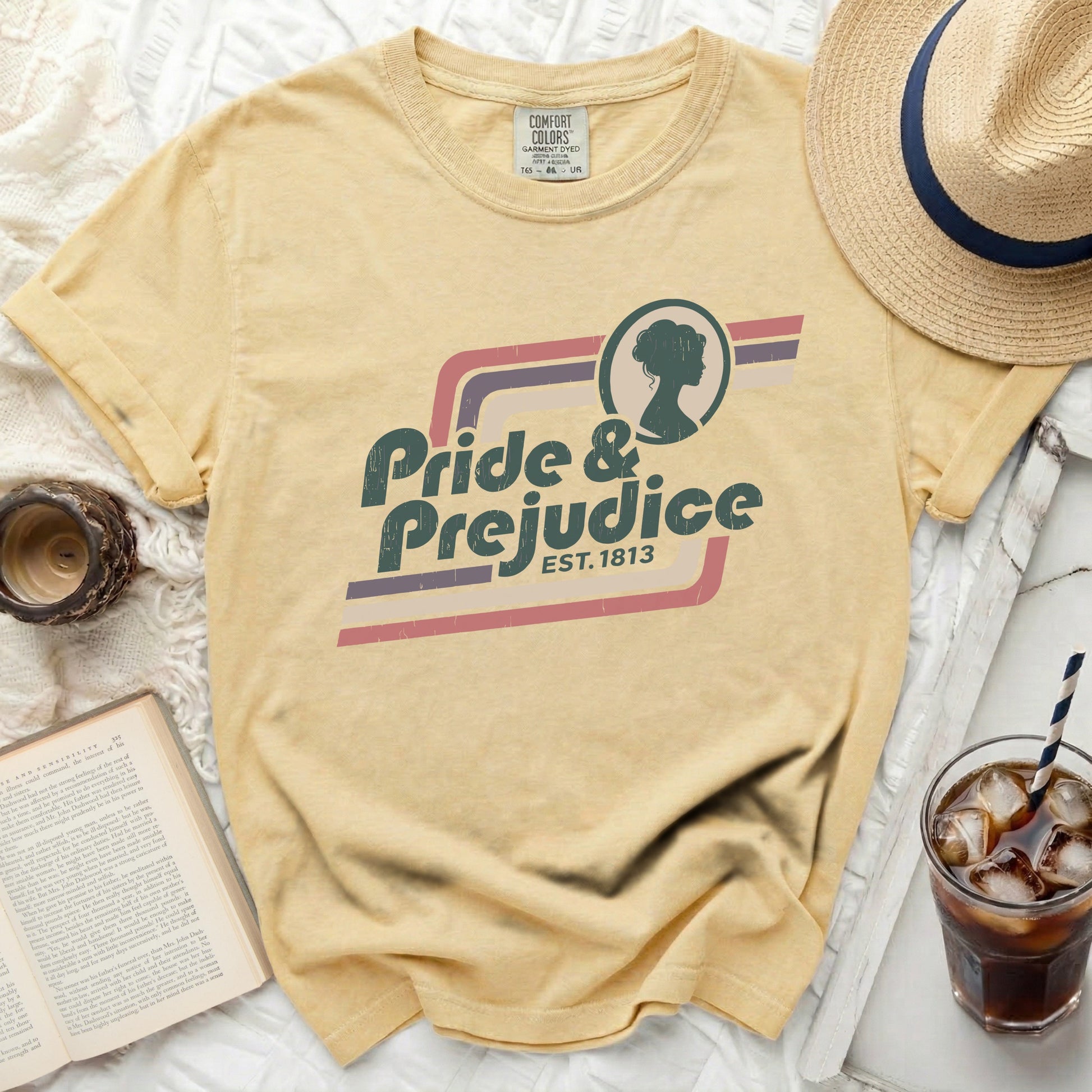 Yellow Comfort Colors t-shirt with "Pride & Prejudice est. 1813" graphic.