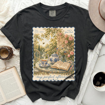 T-shirt with "Tea, Earl Grey, and a Good Book" design and a serene garden scene.