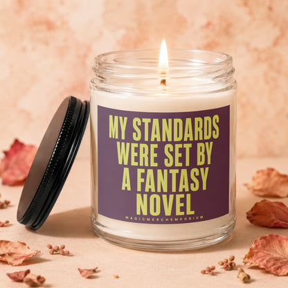 Candle with label "My Standards Were Set By A Fantasy Novel".