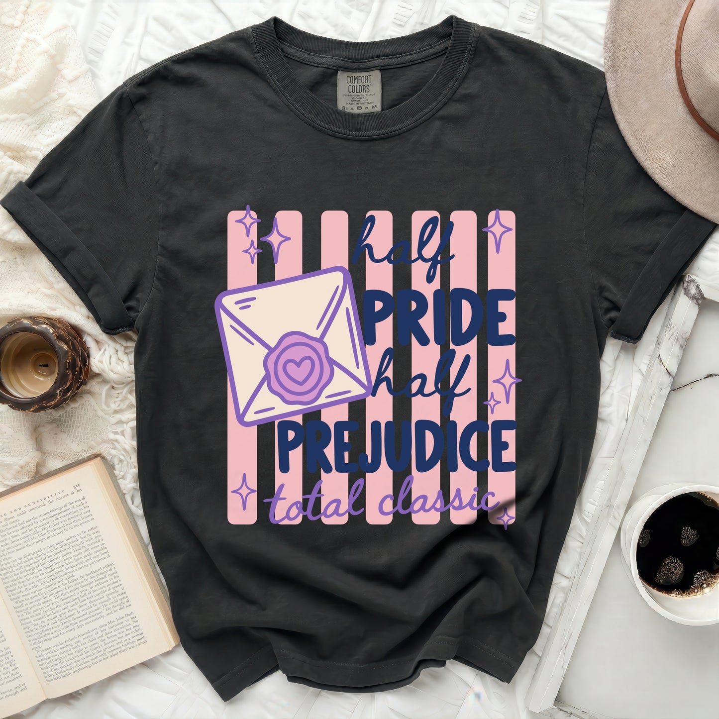 Dark t-shirt with "half pride half prejudice total classic" text and design.