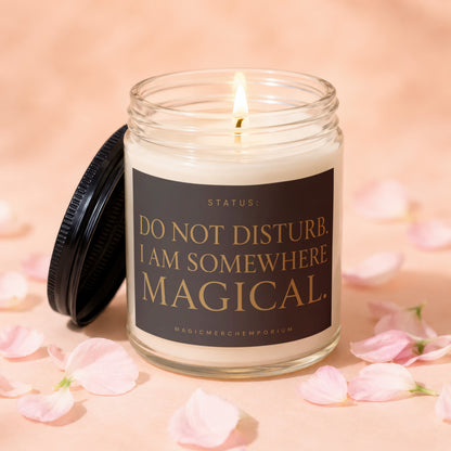 Lit glass candle with a black lid, inscribed "DO NOT DISTURB. I AM SOMEWHERE MAGICAL."