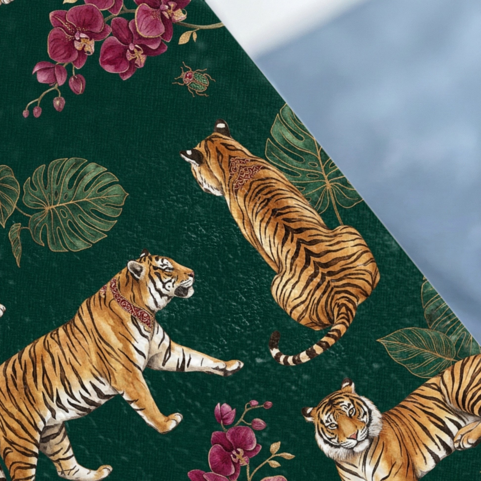 Watercolor tigers, orchids, and monstera leaves on a dark green background.