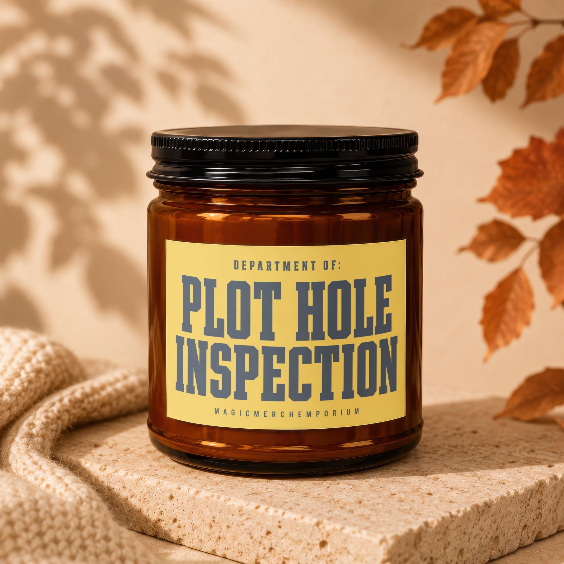 Amber jar candle with yellow label reading "DEPARTMENT OF: PLOT HOLE INSPECTION".