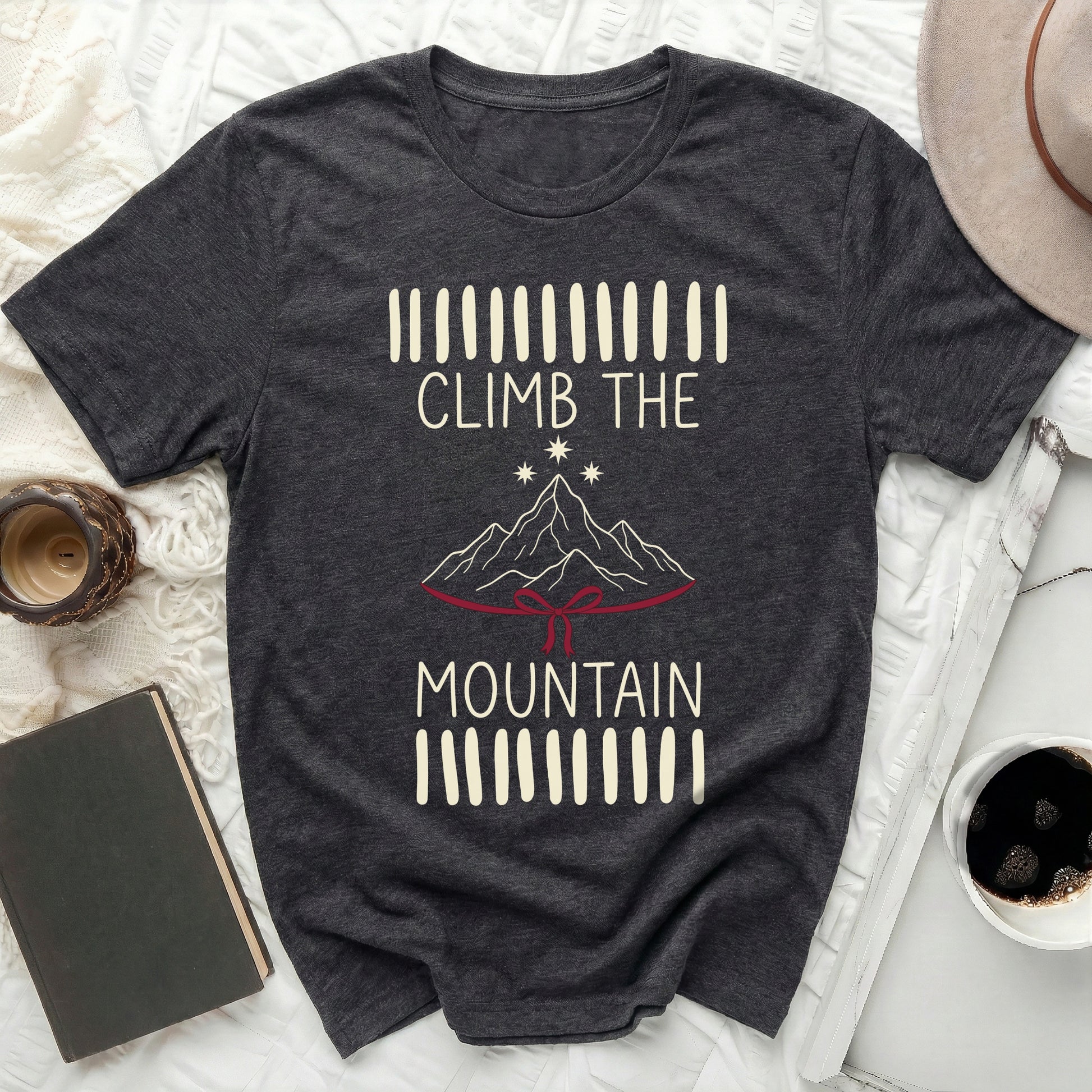 CLIMB THE MOUNTAIN graphic inspirational product type
T-shirt
Graphic tee
Mountain theme
Adventure top
Inspirational shirt
Outdoor exploration
Nature design
Hiking apparel
Climb graphic
Explore shirt
Stars mountains
Ribbon print
Dark gray tee
Short sleeve shirt
Casual wear
Unique design
Motivation gift
Wilderness style
Round neck
Goal oriented