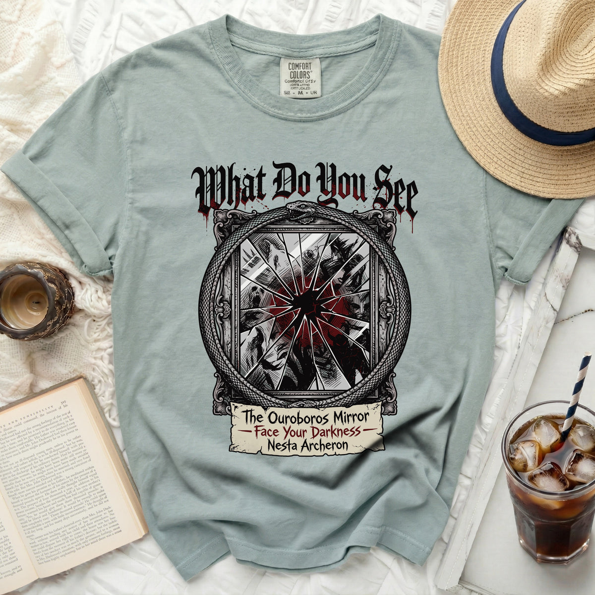 Light blue t-shirt with "What Do You See The Ouroboros Mirror" graphic.