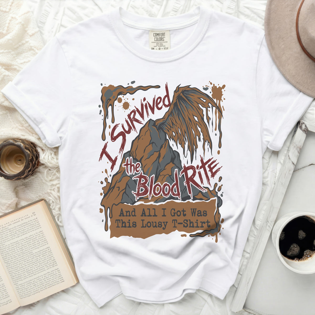 White t-shirt with graphic "I Survived the Blood Rite And All I Got Was This Lousy T-Shirt."