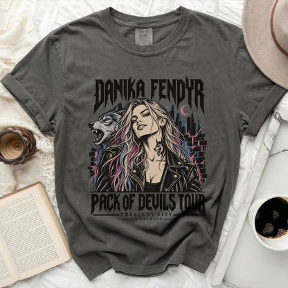 Danika Fendyr Pack of Devils Tour t-shirt with wolf and city graphic.