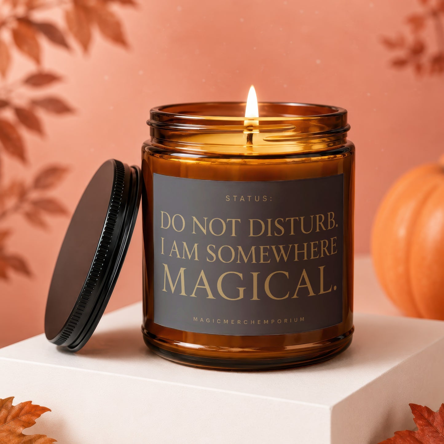 Amber jar candle with lid off, lit wick, and text "Do Not Disturb. I Am Somewhere Magical."