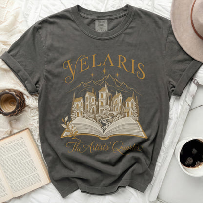 Dark grey t-shirt with gold "Velaris The Artists Quarter" graphic.