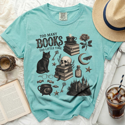 Teal t-shirt with "Too Many Books Too Little Time" and gothic illustrations.