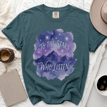 Teal t-shirt with watercolor mountains, stars, and text "To the Stars Who Listen".