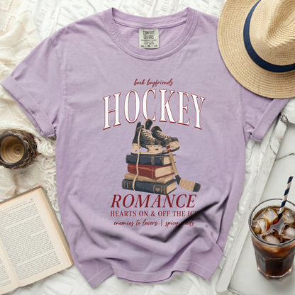 Lavender t-shirt with "book boyfriends HOCKEY ROMANCE HEARTS ON & OFF THE ICE" text.