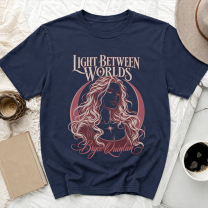Navy t-shirt with "Light Between Worlds Bryce Quinlan" text and a woman's portrait.