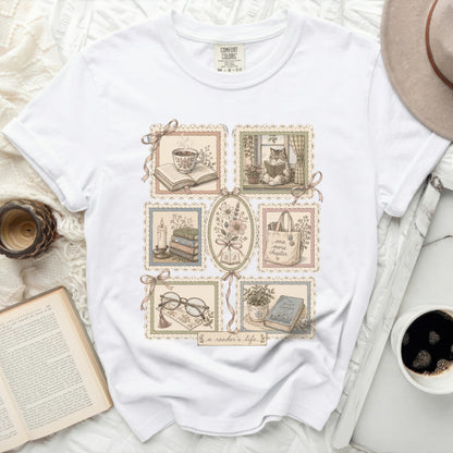 White t-shirt with postage stamp style illustrations of books and reading.