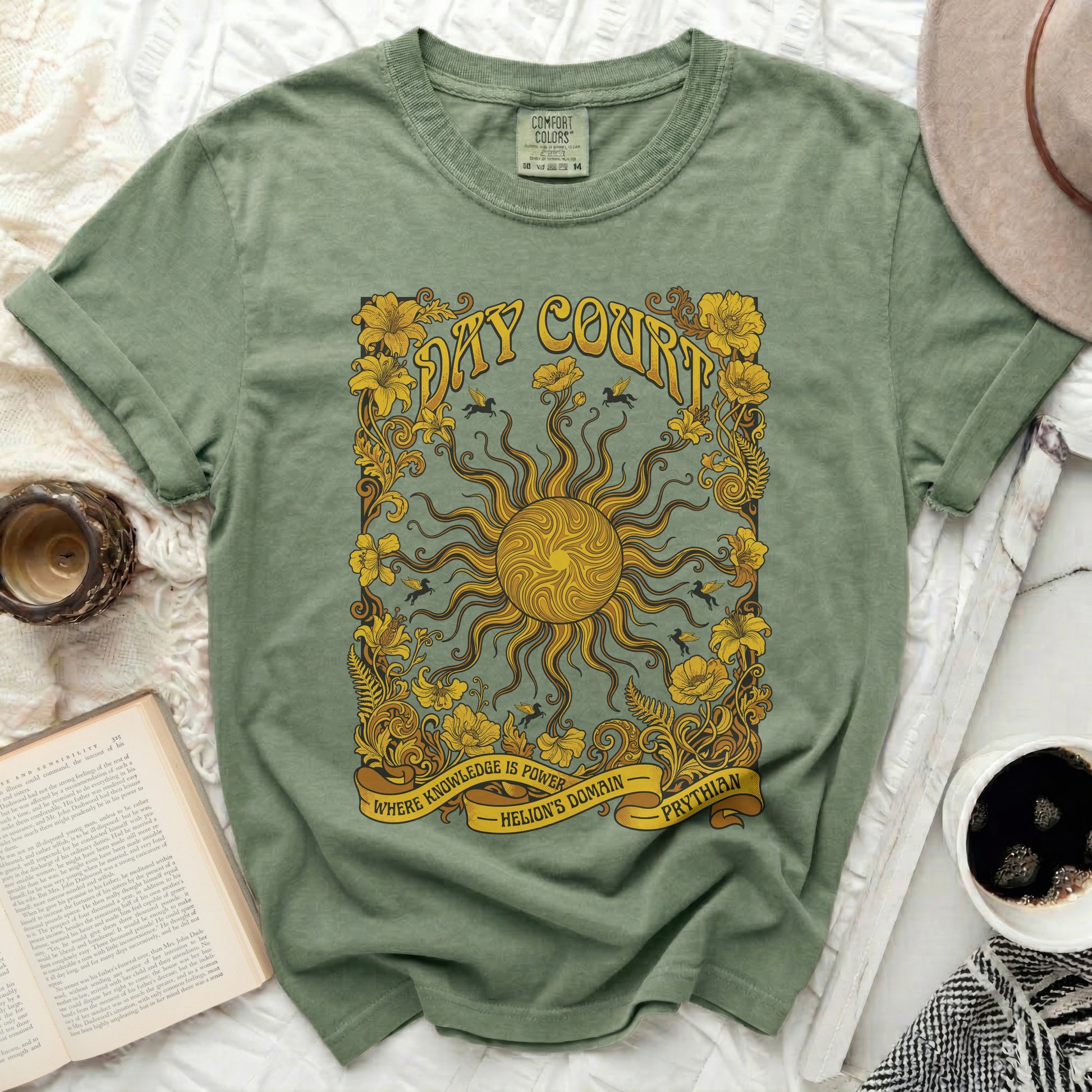 Green t-shirt with sun and floral design; "Day Court" and "Helion's Domain" text.