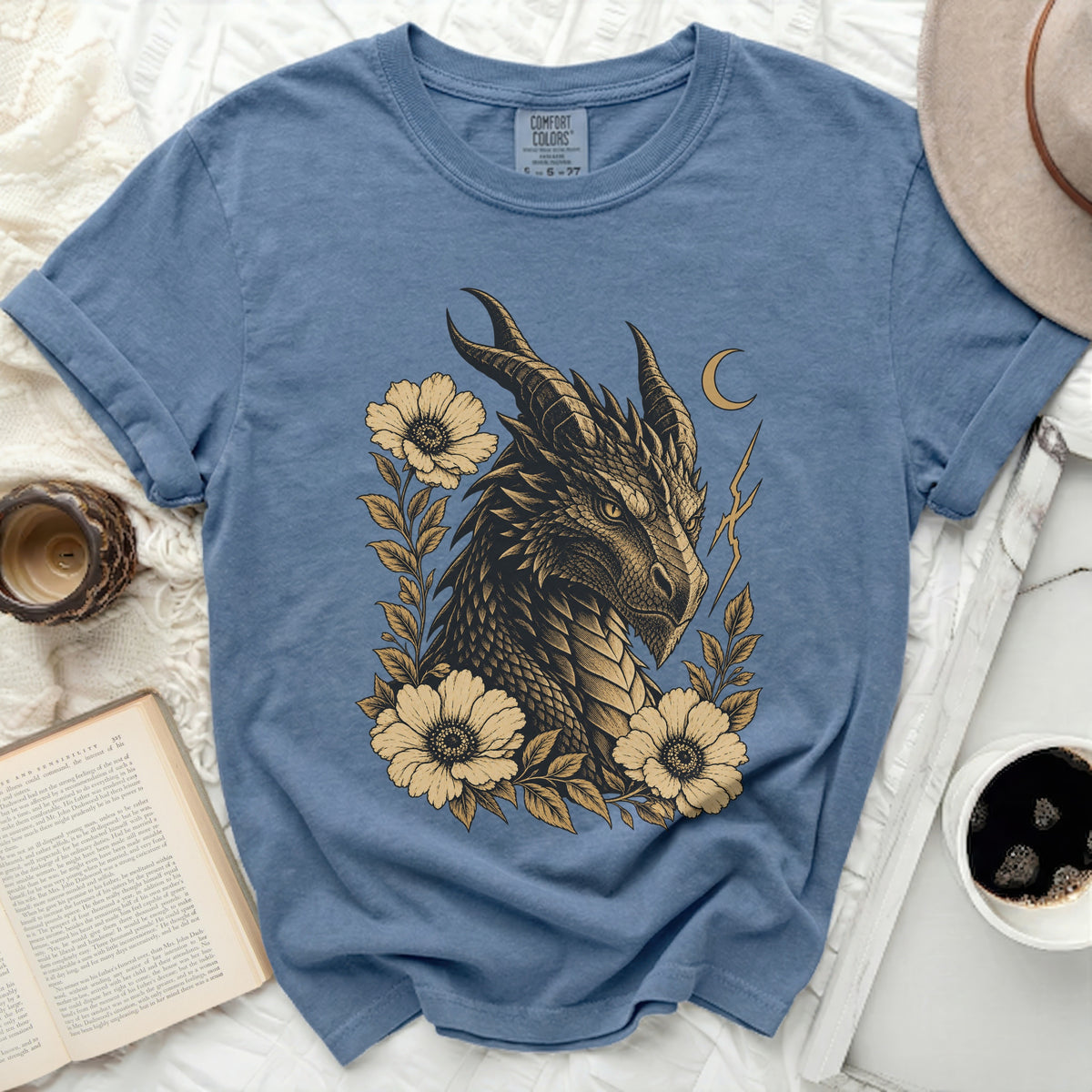 Blue t-shirt with dragon and floral graphic, Comfort Colors brand label visible.