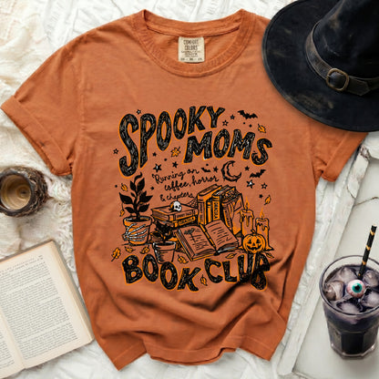 Orange t-shirt with "Spooky Moms Book Club" Halloween graphic.