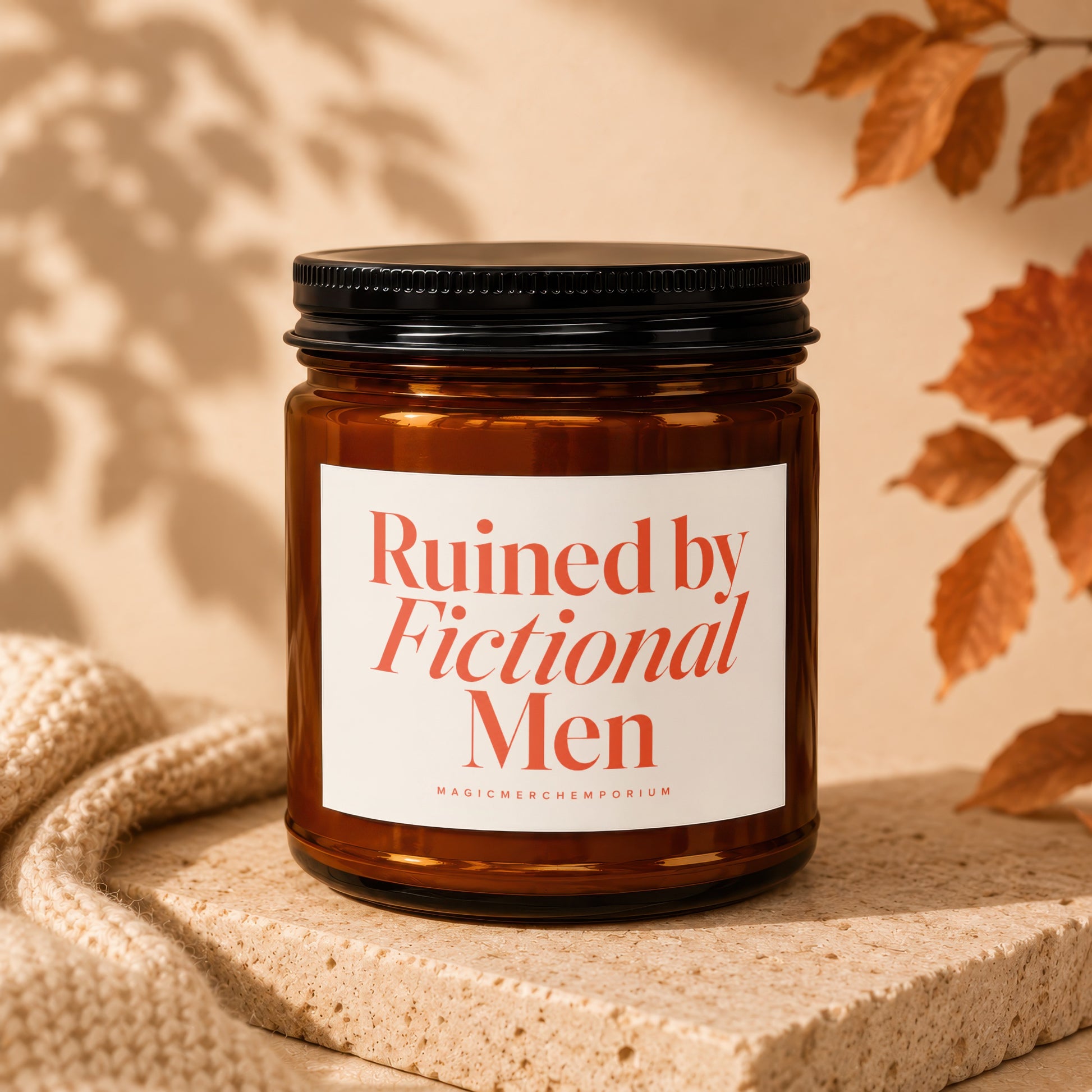 Brown glass candle with a white label that reads "Ruined by Fictional Men".