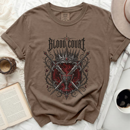 Brown t-shirt with "Blood Court" graphic featuring swords and a crown.