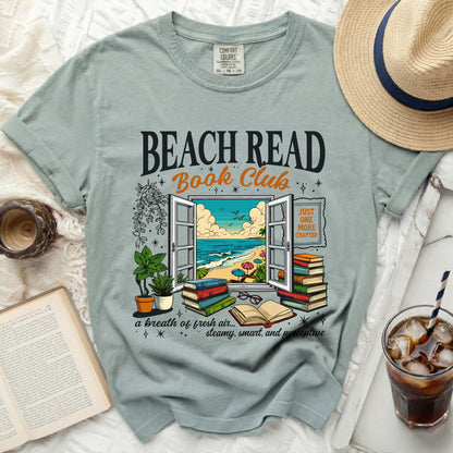 Beach Read Book Club t-shirt with open window overlooking beach and books.