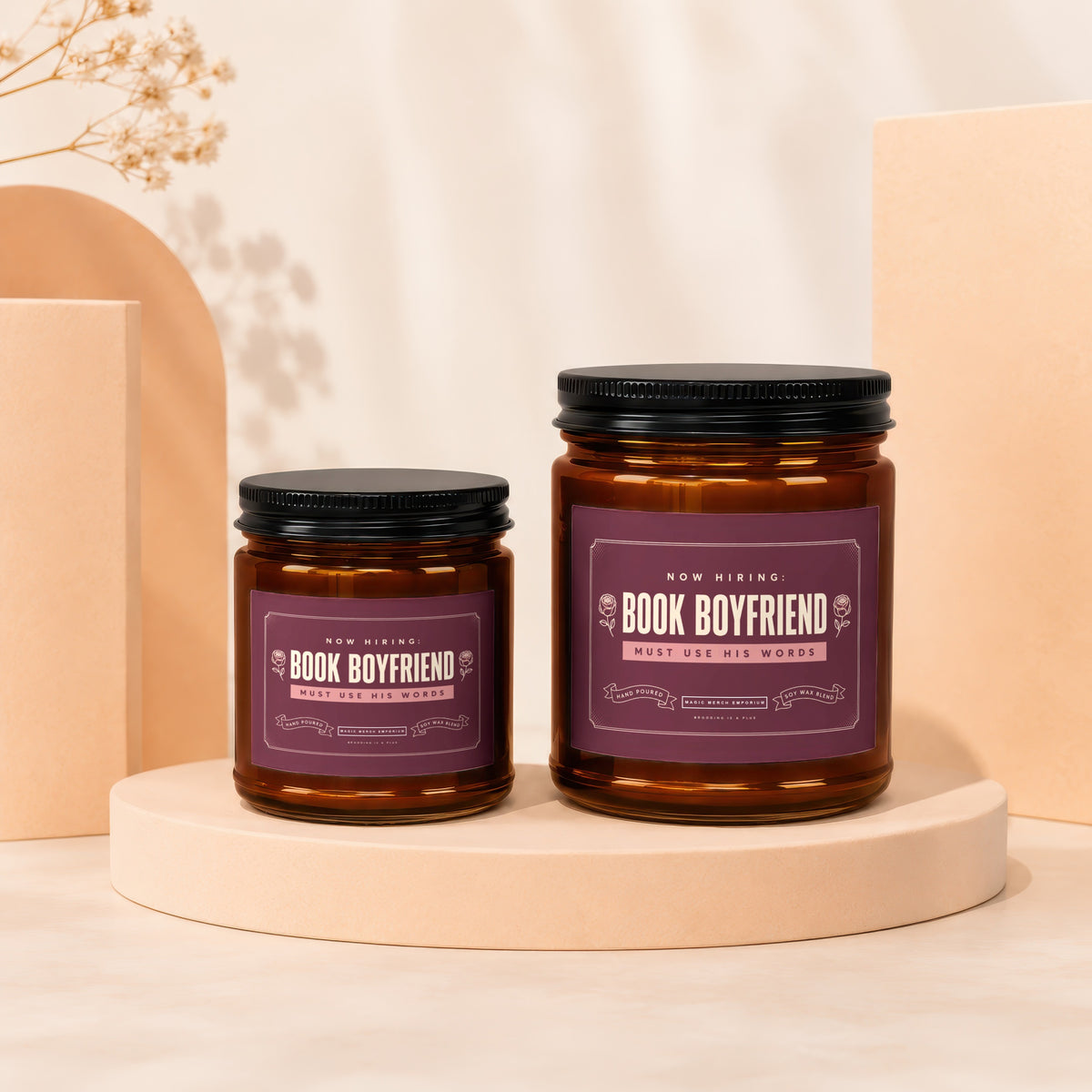 Two amber glass jars with "Book Boyfriend" labels sit on display pedestals.
