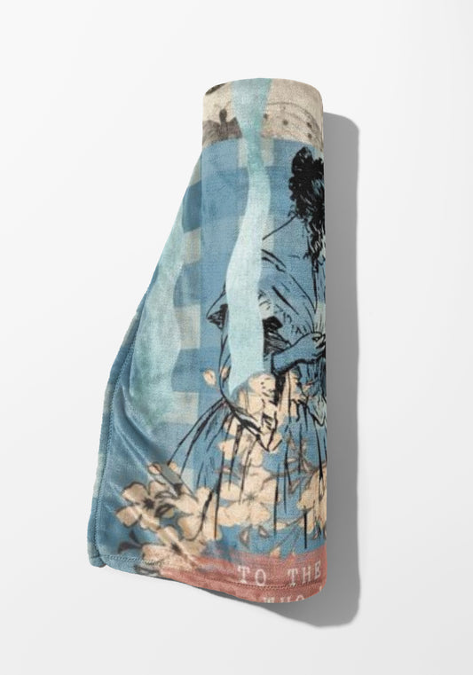 Rolled towel with a blue and beige checkered pattern featuring a sketch of a person and flowers.