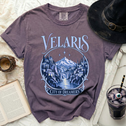 Velaris City of Dreamers graphic t-shirt with a fantasy landscape.