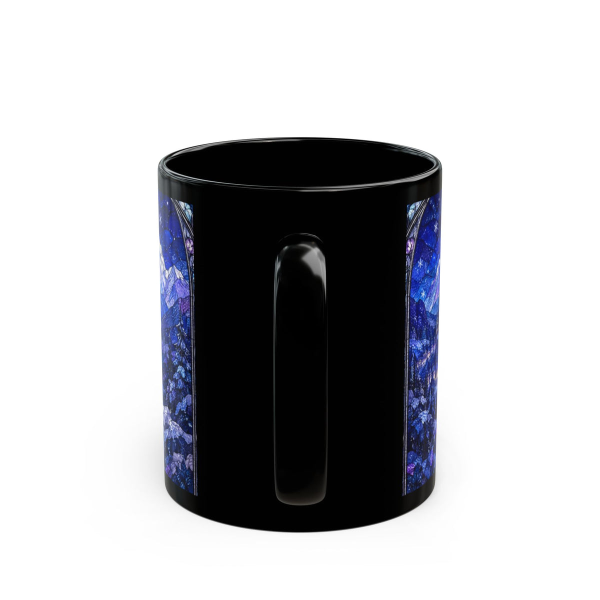 A black ceramic mug featuring a blue stained-glass mountain landscape design flanking the handle.