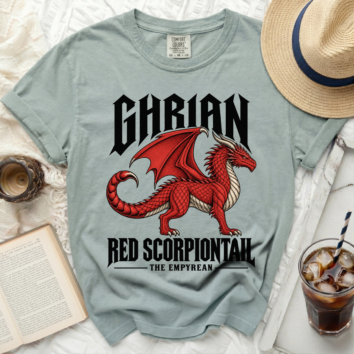 Light blue t-shirt with black gothic text "GHARIAN" above a red dragon and "RED SCORPIONTAIL THE EMPYREAN".
