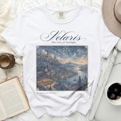 White t-shirt with "Velaris The City of Starlight" and fantastical city art.
