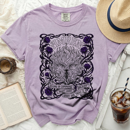 Purple t-shirt with Amren graphic: wolf face, woman, and text.