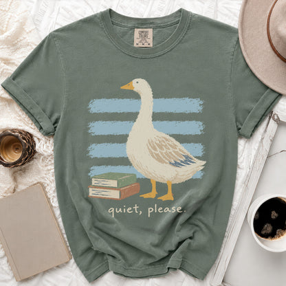 Green t-shirt with a goose, books, and "quiet, please" text.