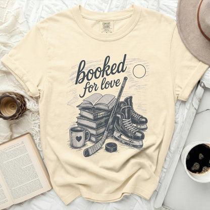 Comfort Colors t-shirt with "booked for love" text and hockey illustration.