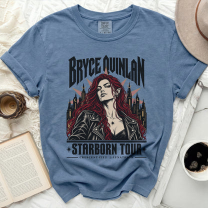 Blue t-shirt with Bryce Quinlan "Starborn Tour" graphic featuring a woman.