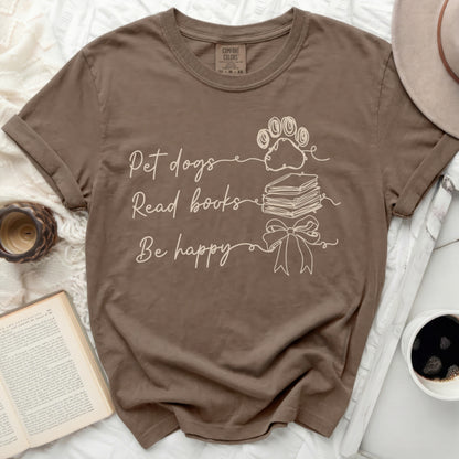 Brown t-shirt with text "Pet dogs Read books Be happy"