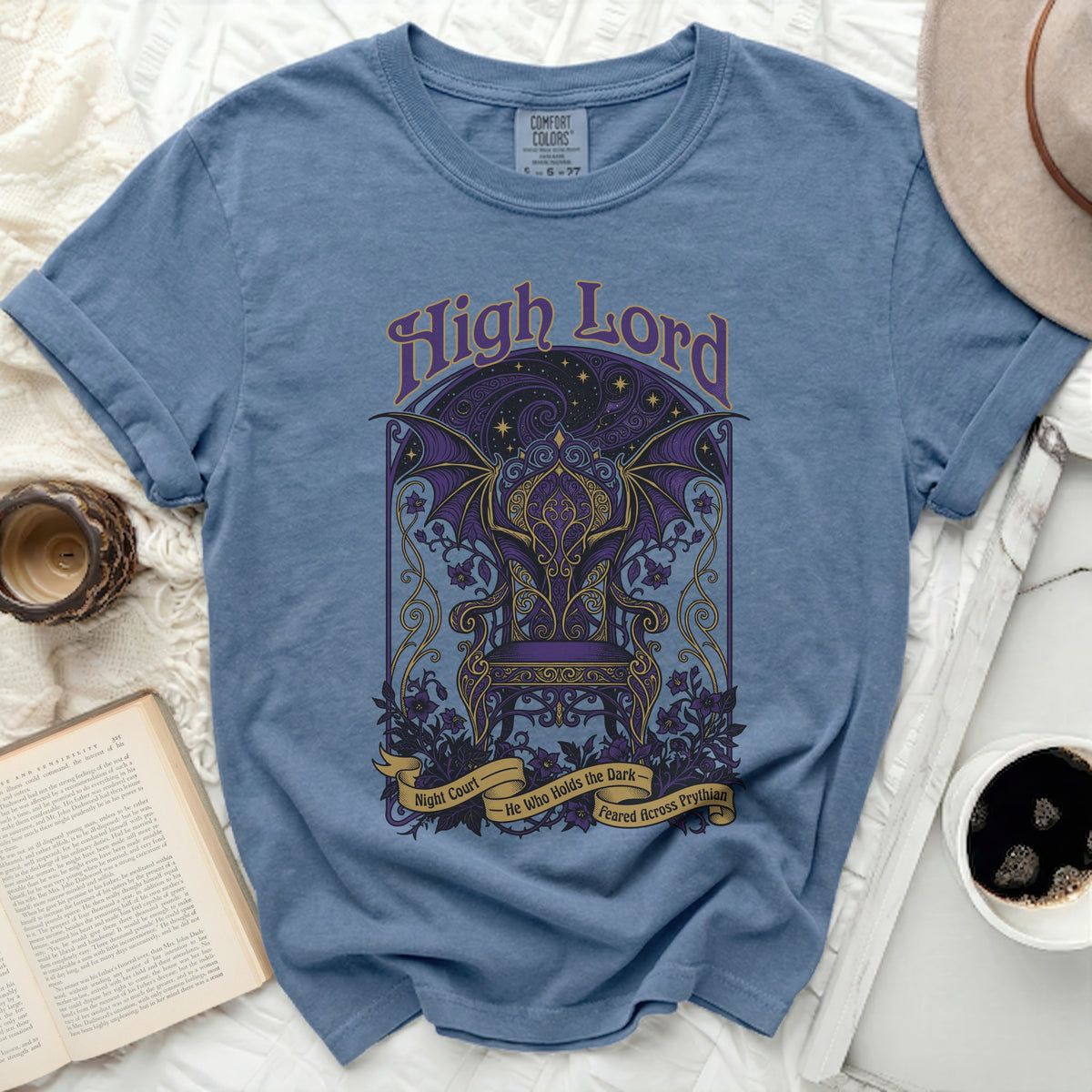 Blue t-shirt with "High Lord" and ornate throne with wings graphic.