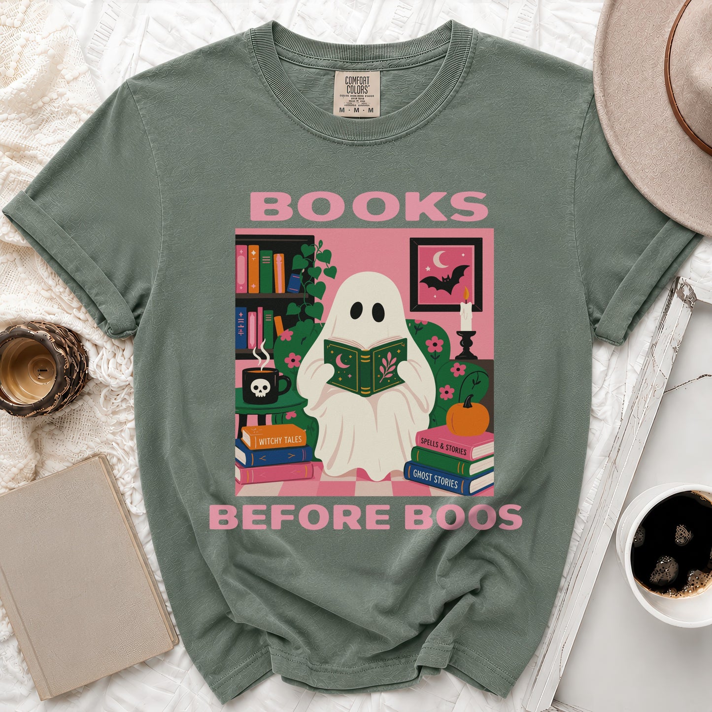 Ghost reading a book with text "Books Before Boos" and Halloween-themed decor.