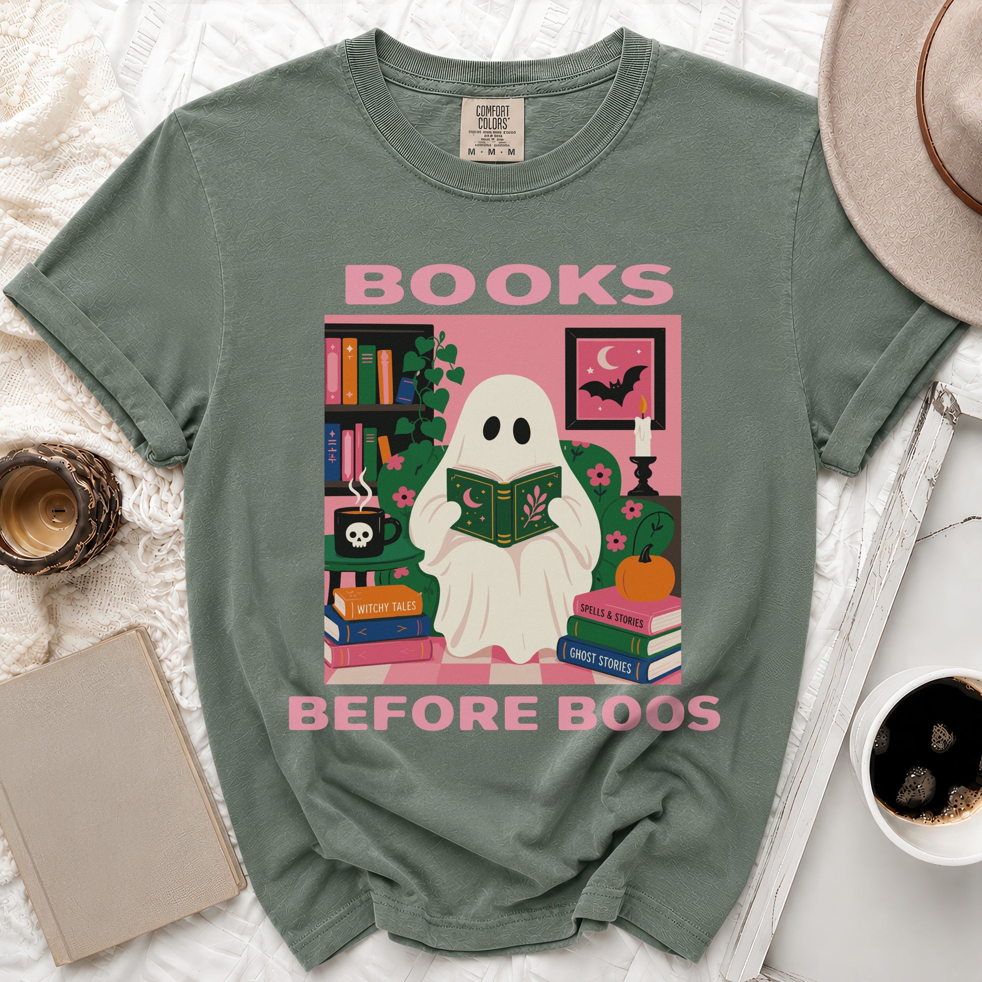 Ghost reading a book with text "Books Before Boos" and Halloween-themed decor.